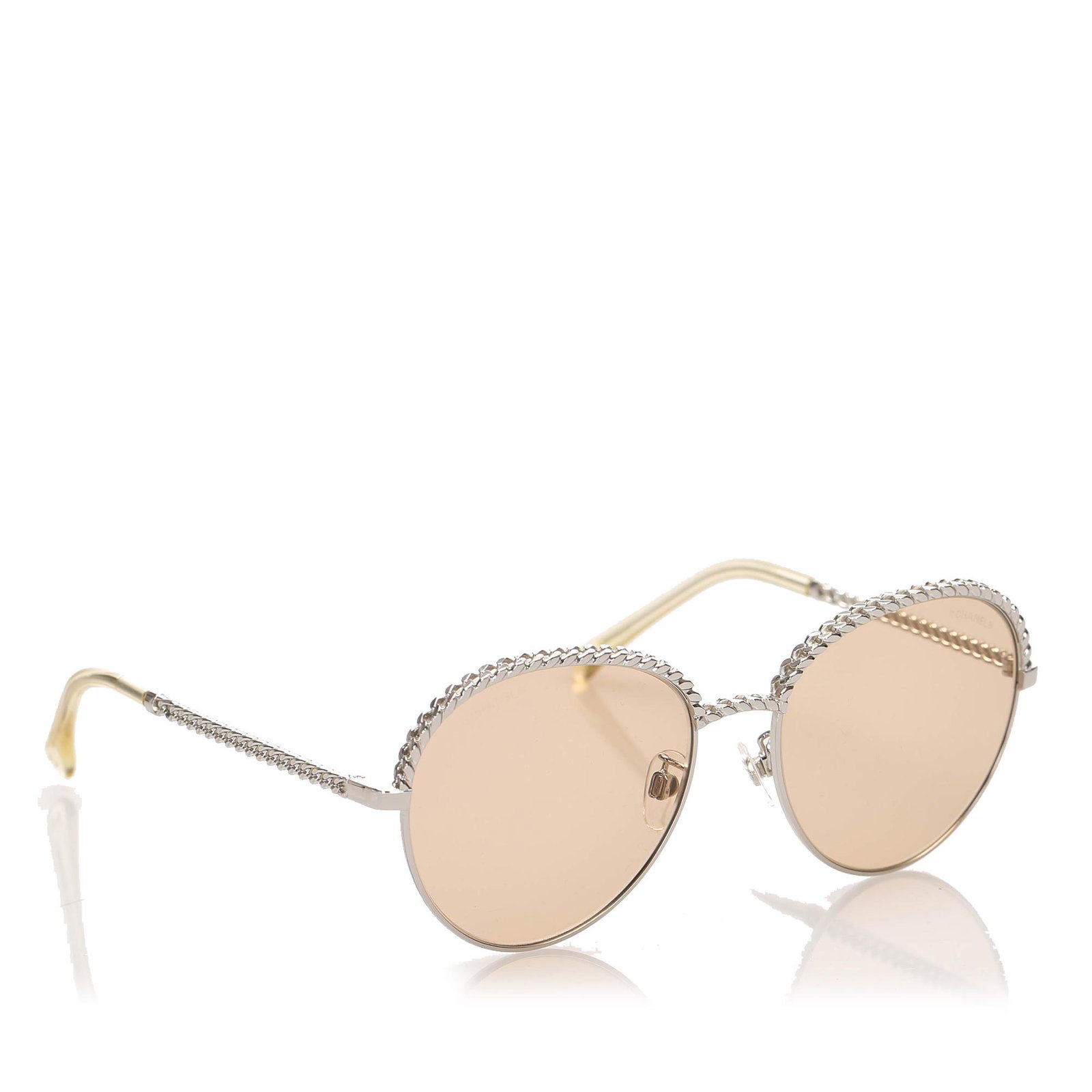 Authentic Chanel Round Tinted Sunglasses: These sunglasses feature a metal body with faux pearls and tinted lenses. Brand: Chanel Model: Round Tinted Sunglasses Origin: Italy Category: Sunglasses Color: Silver Style: Others Material: Metal x 