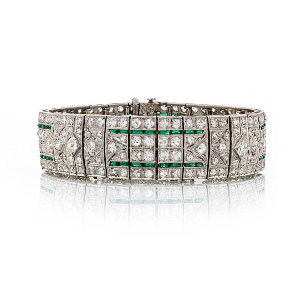 Platinum Vintage Bracelet: Type: Vintage Bracelets Metal: Platinum Grams: 48.6 Exact Diamond Weight: 25 Cts Other Details: 213 Diamond & Green Emeralds All Bidhaus items come with a 100% money-back a