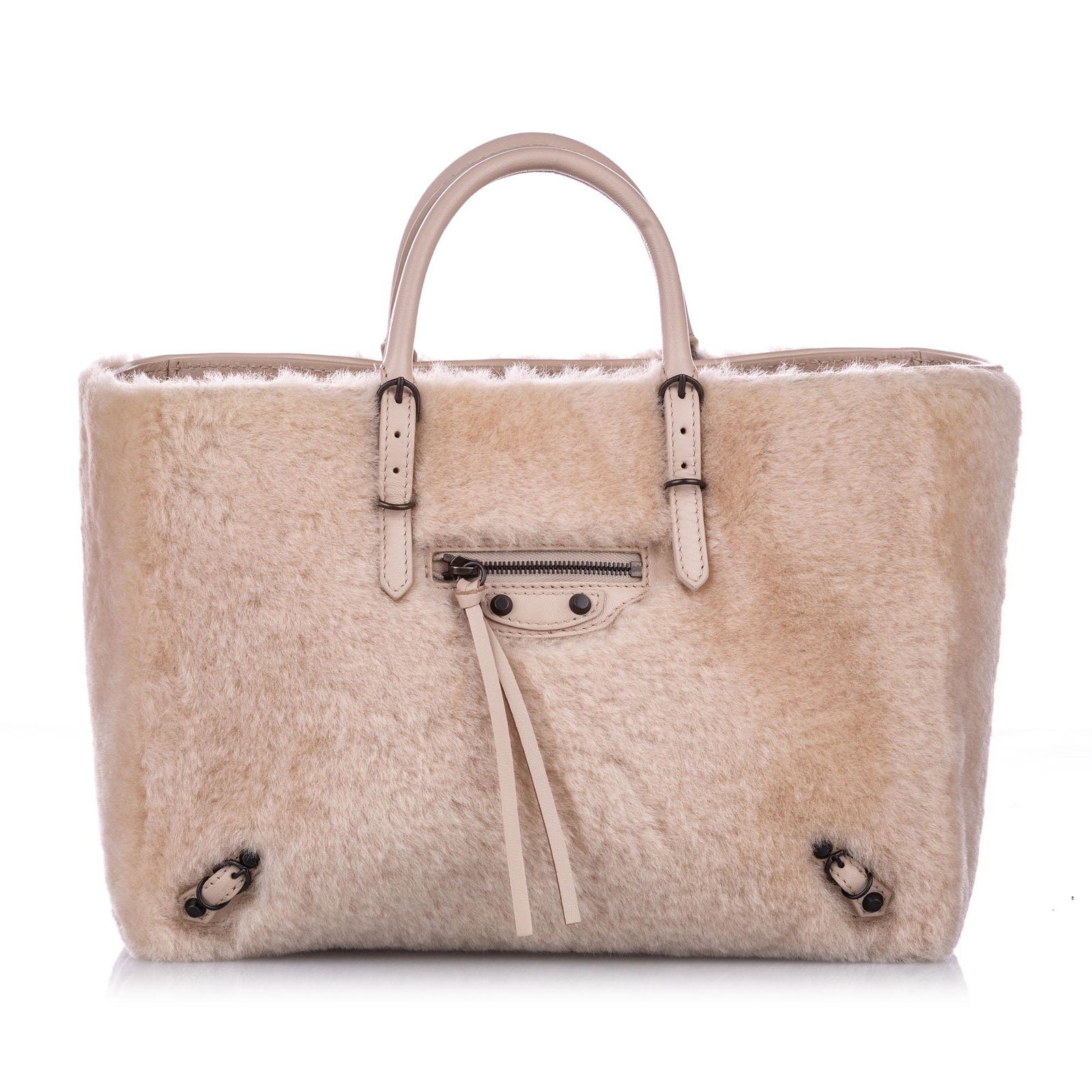 Authentic Balenciaga Shearling Papier A6 Fur Satchel: The Papier A6 satchel features a fur body an exterior front zip pocket rolled leather handles a detachable flat strap an open top and an interior zip pocket. Brand: Balenciaga Model: Shearling Papier 