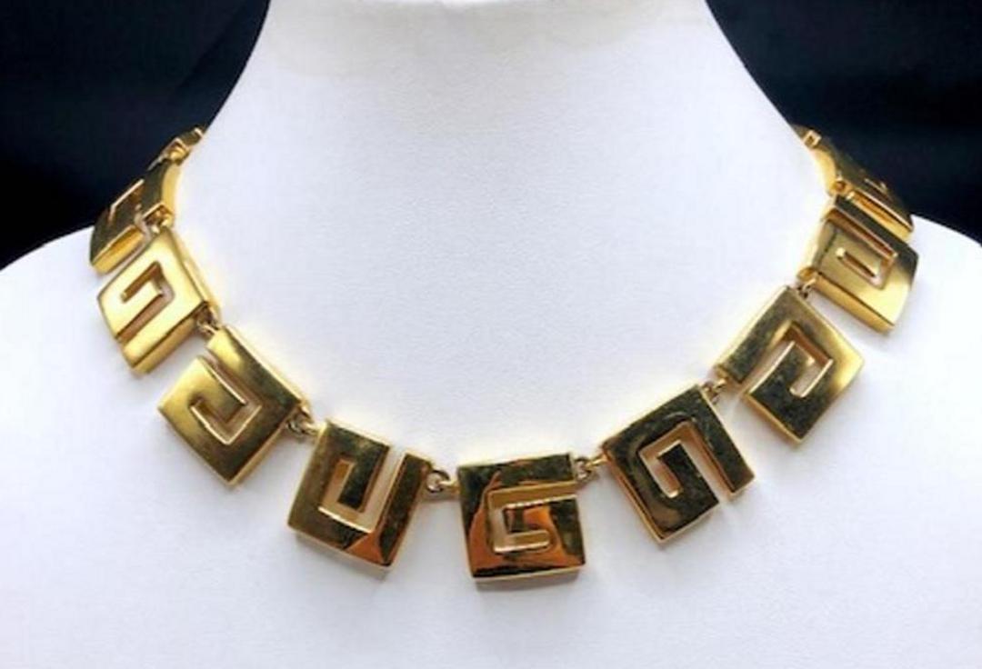 Authentic Givenchy G Monogram Eternity Neckalce: Brand: Givenchy Material: Gold-plated Style: Chain Dimensions(inch): 15 L x 1 W (additional 4” extension) Hallmark: Givenchy Country of Origin: France All Bidhaus items come with a 100% money-ba
