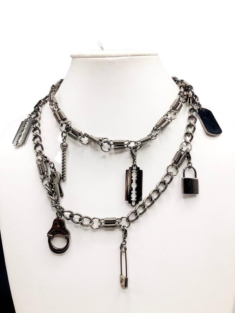 Authentic Versace Gunmetal Charm Necklace: Brand: Versace Style: Chain Hallmark:: yes Fastening: Lobster clasp Category: Necklace Materials: Metal Size: Other Remarks: Can be worn long, doubled, or as a belt All Bidhaus items come with a 100%