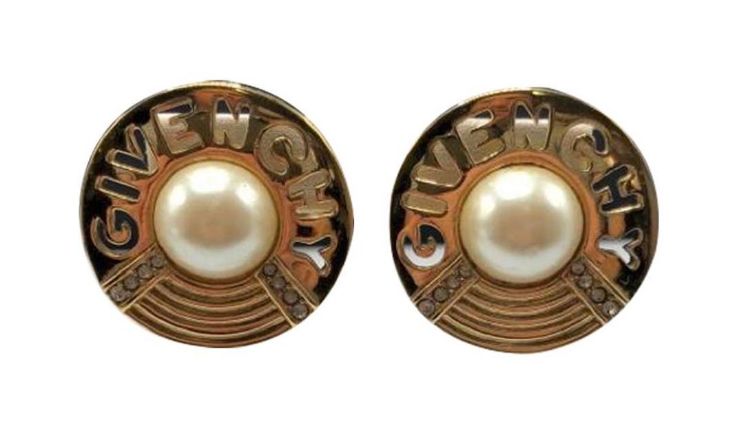 Authentic Givenchy Monogram Pearl Earrings: Brand: Givenchy Material: Gold-plated Style: EarringsClip Hallmark: Givenchy Country of Origin: France All Bidhaus items come with a 100% money-back authenticity guarantee. ALL SALES ARE FINAL. Please