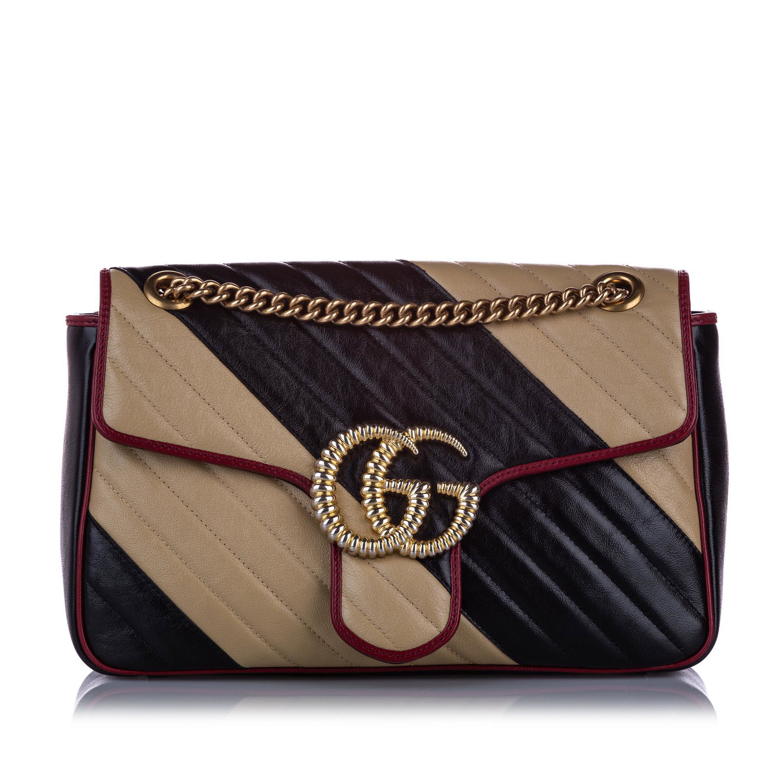 Authentic Gucci Medium GG Marmont Leather Shoulder Bag: The Marmont shoulder bag features a quilted leather body an adjustable flat leather strap with gold-tone chain a front flap with a magnetic closure and interior zip and slip pockets. Brand: Gucci Mode