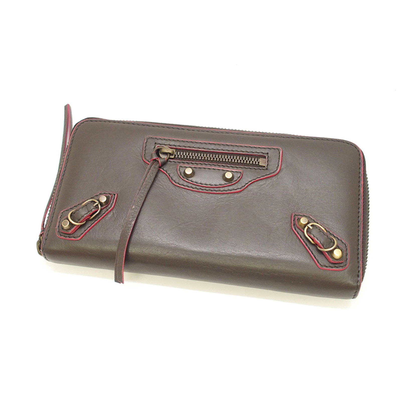 Authentic Balenciaga Motocross Leather Wallet: This wallet features a leather body, stud details, a front exterior zip pocket, a zip around closure, and interior zip and slip compartments.Brand: Balenciaga Model: Motocross Leather Wallet Origin: I