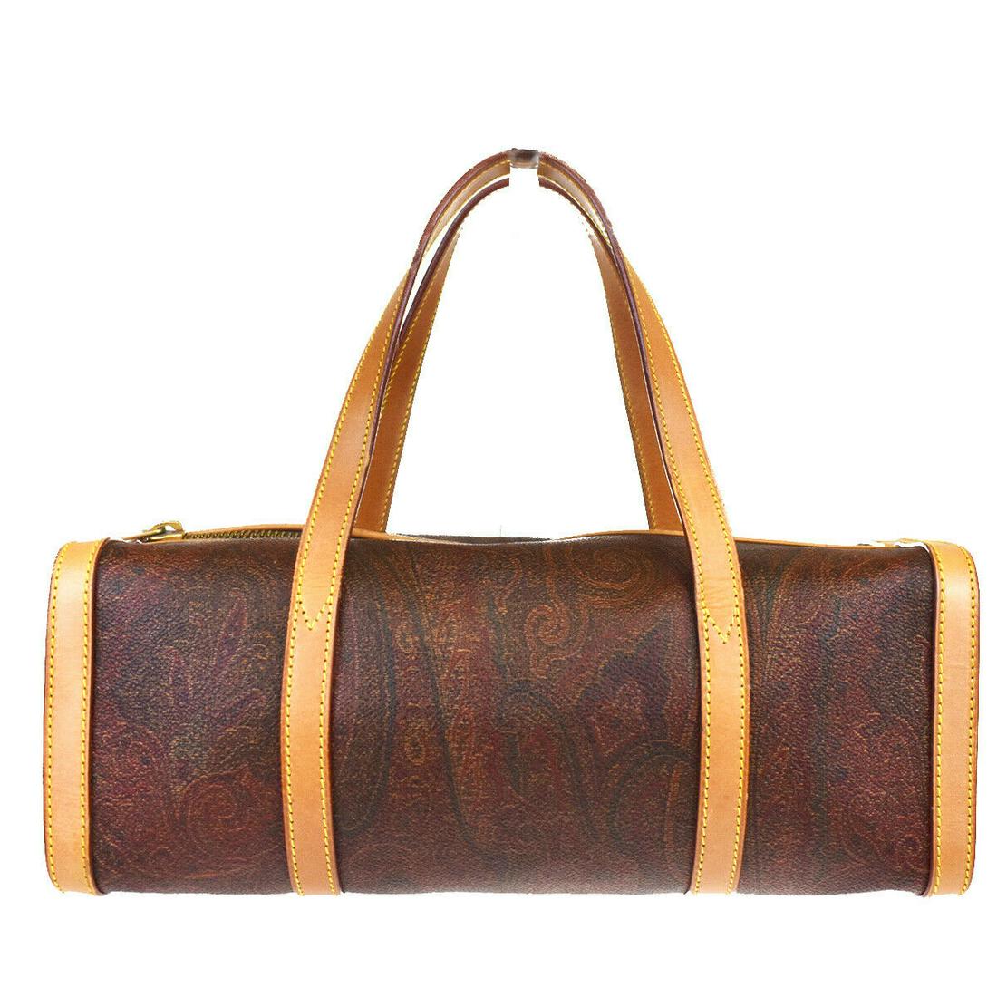 Authentic ETRO Hand Bag: Brand: ETRO Model: Hand Bag Country of Origin: Italy Material: PVC Leather Color: Bordeaux Size (Inch): W11X H4.1X D3.9"Size (CM): W28X H10.5X D10Cm All Bidhaus items come with a 100 % money-back auth