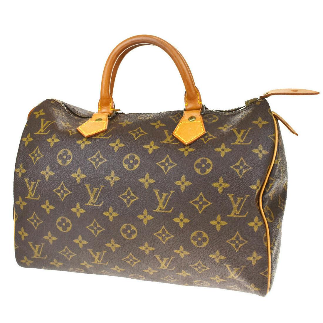 Authentic LOUIS VUITTON Hand Bag: Brand: LOUIS VUITTON Model: Hand Bag Country of Origin: France Material: Monogram Leather Color: Brown Size (Inch): W 11.8 X H 8.3 X D 6.7 "Size (CM): W 30 X H 21 X D 17 Cm All Bidhaus items come with