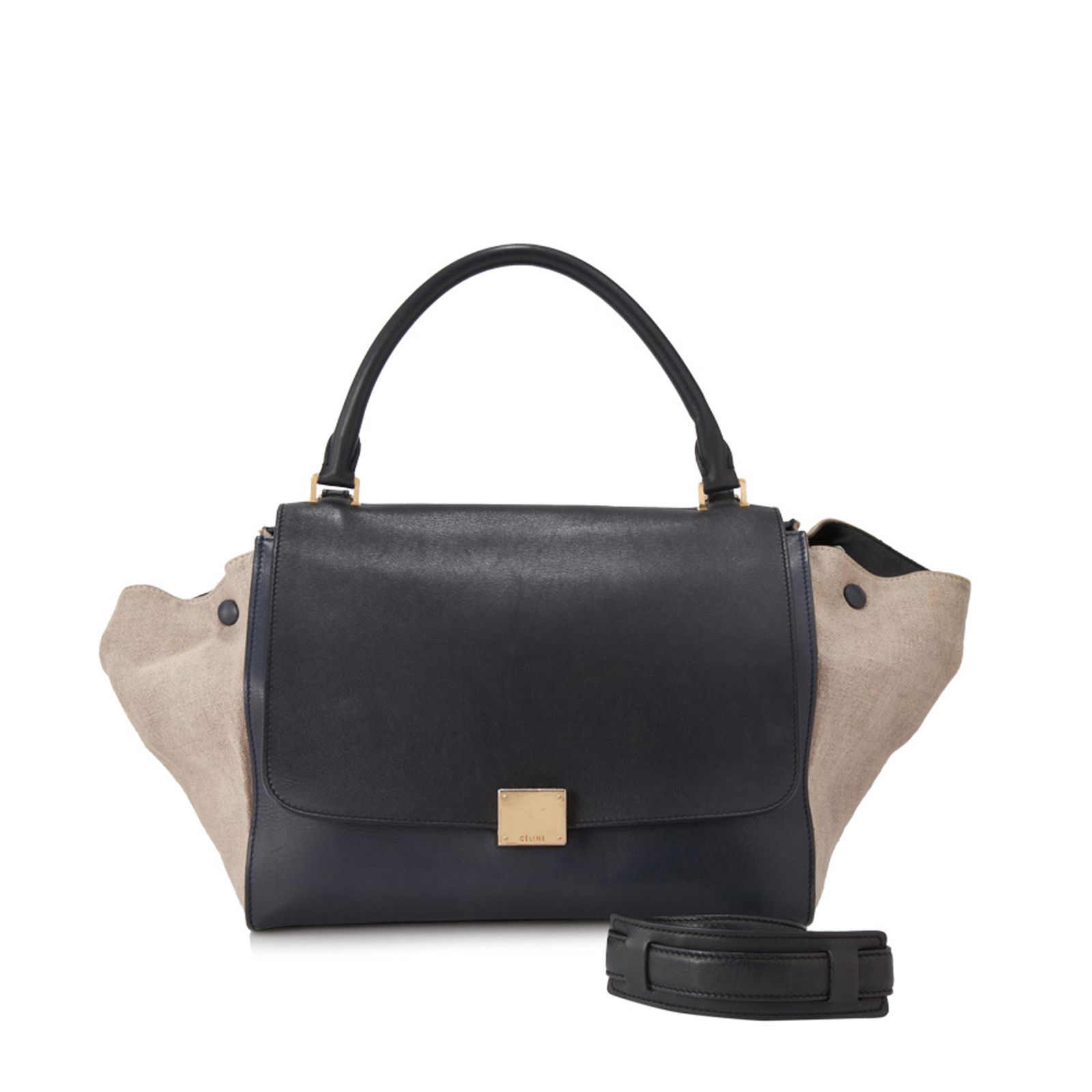 Authentic Celine Suede Trapeze Satchel: The Trapeze satchel features a suede body, a rolled top handle, a detachable shoulder strap, a front flap with a clasp closure, a top zip closure, and interior slip pockets.Brand: Celine Model: Suede