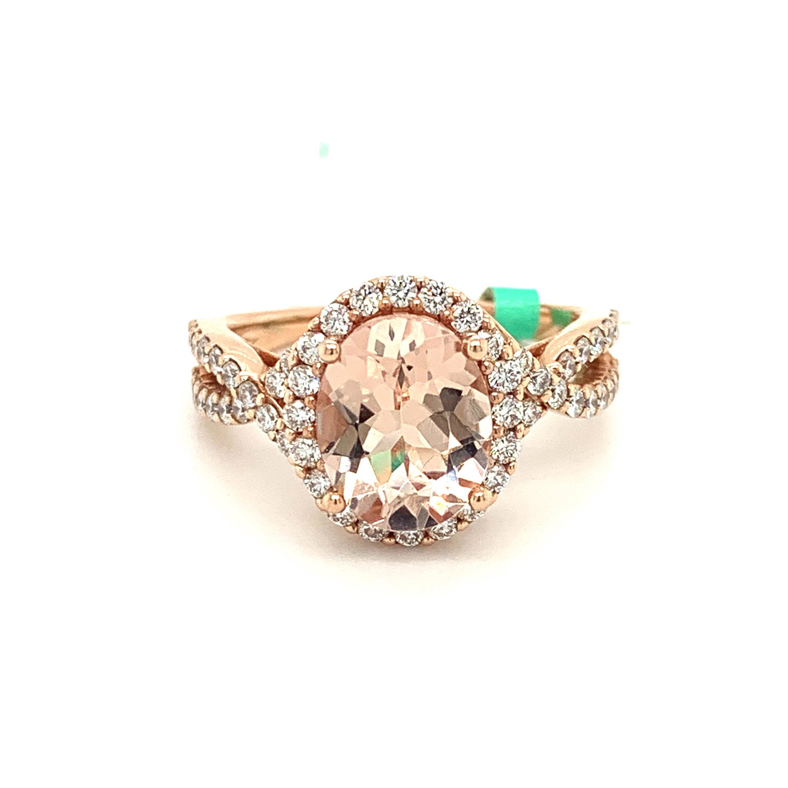 Ring: Jewelry Type : Ring Jewelry Style : Halo Metal Type : 14KR Metal Weight : 4.50 g Center Stone : Stone Type : Morganite Center Stone : Shape : Oval Center Stone : Stone Weight : 2.30 Center Stone : Qua