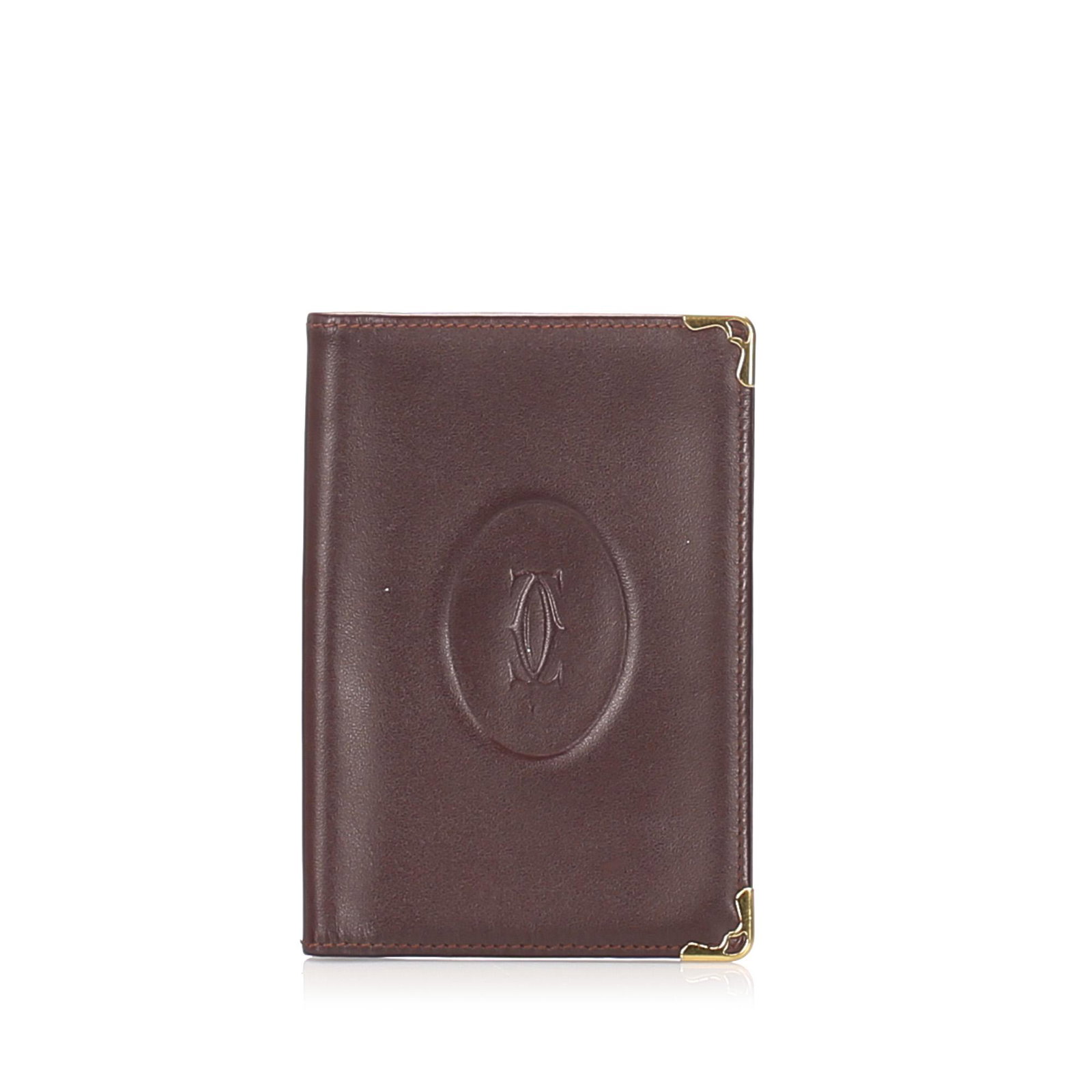 Authentic Cartier Must De Cartier Leather Passport: This passport cover features a leather bi fold body. Brand: Cartier Model: Must De Cartier Leather Passport Cover Origin: France Category: Passport Cover Color: Red x Bordeau Style: Others Material: L