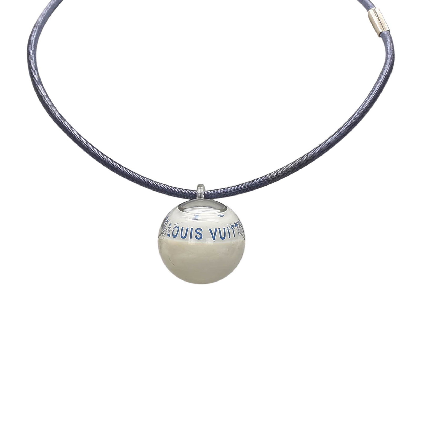 Authentic Louis Vuitton Lv Cup 2000 Compass Necklace: The Compass necklace features a compass pendant and a stretch cord.Brand: Louis Vuitton Model: LV Cup 2000 Compass Necklace Origin: France Category: Costume Necklace Color: White x Blue x Dark Blue St