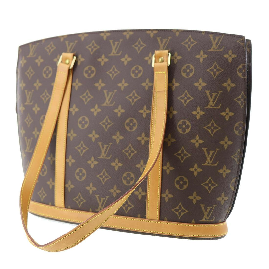 Authentic LOUIS VUITTON Shoulder Tote Bag: Brand: LOUIS VUITTON Model: Shoulder Tote Bag Country of Origin: France Material: Suede Color: Gold Bag Length: 16.1 Bag Height: 12.2 Bag Depth: 4.3 All Bidhaus items come with a 100 % money-back auth
