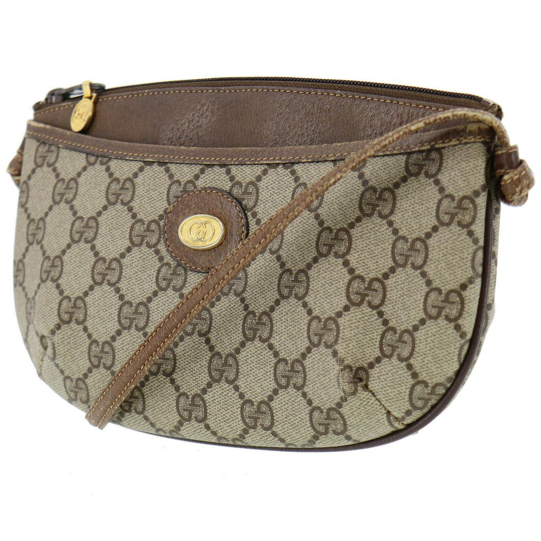 Authentic GUCCI Shoulder Bag: Brand: GUCCI Model: Shoulder Bag Country of Origin: Italy Material: Leather Color: Gold Bag Length: 8.6 Bag Height: 5.9 Bag Depth: 1.9 All Bidhaus items come with a 100 % money-back authenticity guara