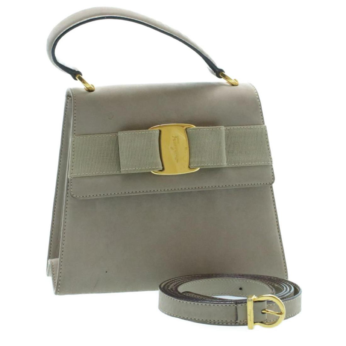 Authentic SALVATORE FERRAGAMO Suede Leather Hand Bag: Brand: SALVATORE FERRAGAMO Material: Suede Leather Style: Hand Bag Color: Gray Size(inch): W7.2 x H6.6 x D3.1â€³ / Strap Length â€œ(Approx) Country of Origin: ITALY Accessory: Shoulder Strap