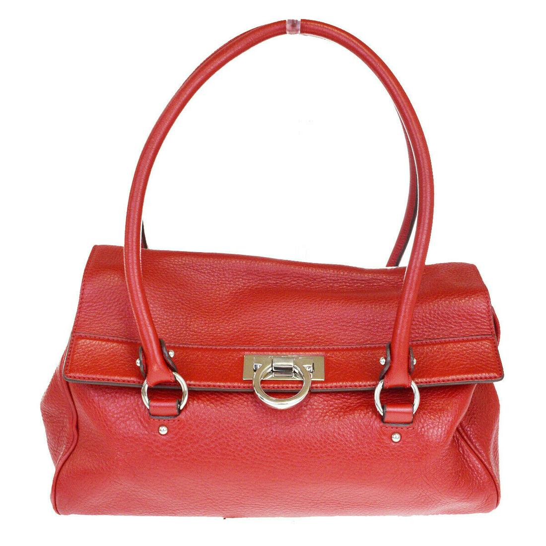 Authentic SALVATORE FERRAGAMO Shoulder Bag: Brand: SALVATORE FERRAGAMO Model: Shoulder Bag Country of Origin: Material: Leather Color: Red Size (Inch): W13X H7.5X D5.1"Size (CM): W33X H19X D13Cm All Bidhaus items come with a 100 % money-back au