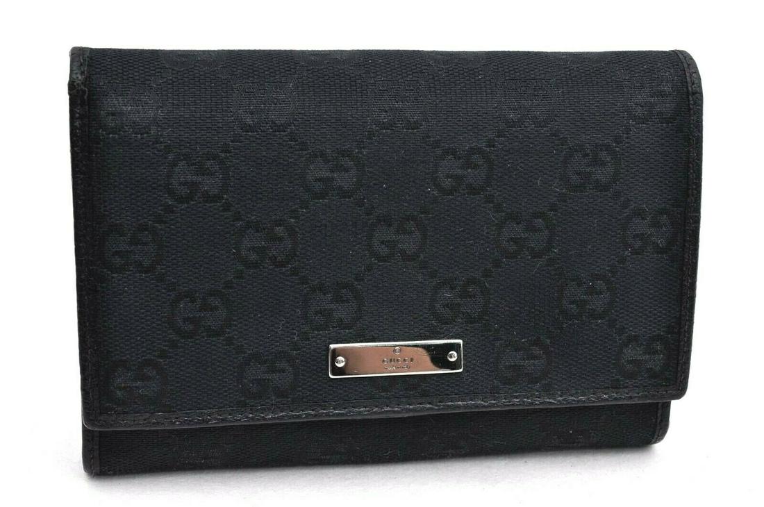 Authentic GUCCI Wallet: Brand: GUCCI Model: Wallet Country of Origin: Italy Material: Canvas Color: Black Bag Length: 5.7inches(14.5cm) Bag Height: 3.9inches(10cm) Bag Depth: 1.2inches(3cm) All Bidhaus items come with a 100 