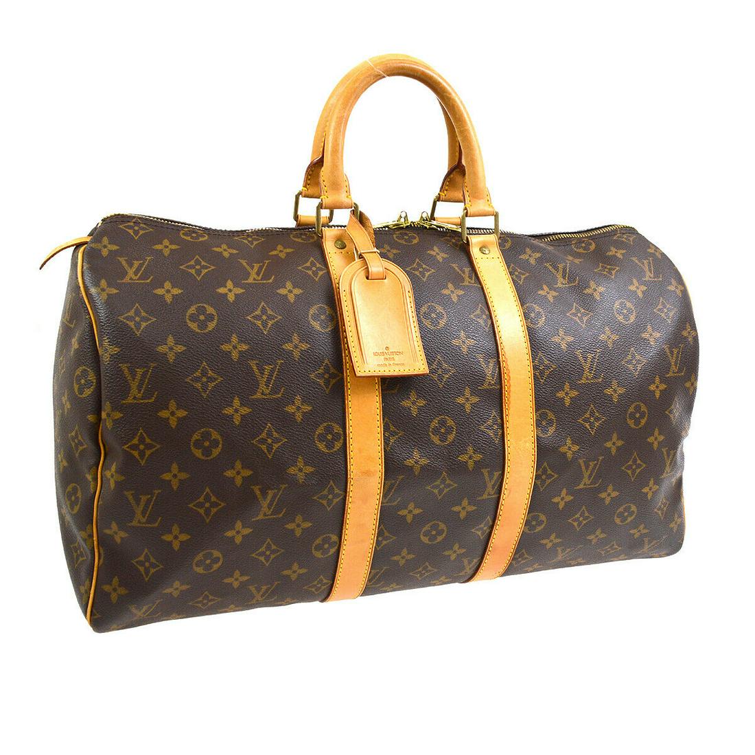 Authentic LOUIS VUITTON Keepall 45 Double Handles: Brand: LOUIS VUITTON Model: Keepall 45 Double Handles Country of Origin: France Material: Canvas Color: Brown Size (Inch): W 17.7 x H 10.0 x D 7.9 " Handle Drop. 4.3 " Size (CM): W 45.0 x H 25.5 x D 2