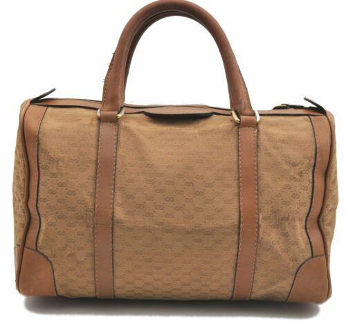 Authentic GUCCI Hand Bag: Brand: GUCCI Model: Hand Bag Country of Origin: Italy Material: Canvas Color: Beige Bag Length: 13.2inches (33.5cm) Bag Height: 7.9inches (20cm) Bag Depth: 6.5inches (16.5cm) All Bidhaus items come wi