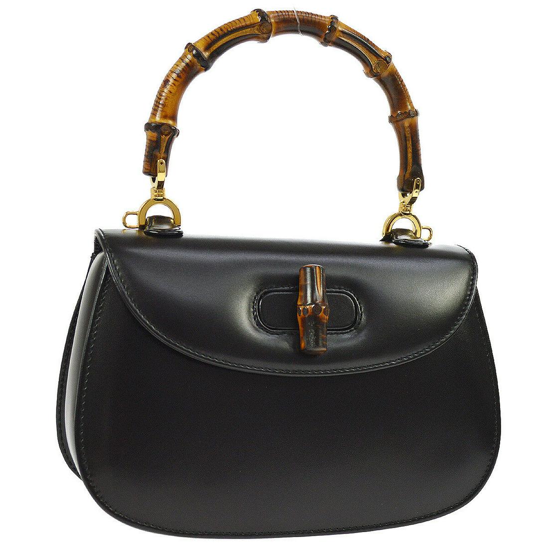Authentic GUCCI Hand Bag: Brand: GUCCI Model: Hand Bag Country of Origin: Italy Material: Leather Color: Black Size (Inch): W 8.7 x H 5.9 x D 3.5 " Handle Drop. 4.7 " Strap Drop. 19.7 " Size (CM): W 22.0 x H 15.0 x D 9.0 cm Ha