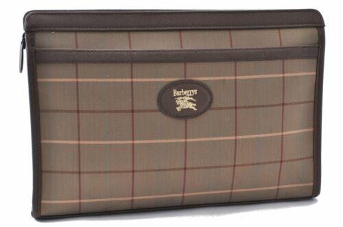Authentic BURBERRY Clutch Bag: Brand: BURBERRY Model: Clutch Bag Country of Origin: Material: Canvas Color: Brown Bag Length: 11inches(28cm) Bag Height: 7.5inches(19cm) Bag Depth: 2.6inches(6.5cm) All Bidhaus items come with a 100