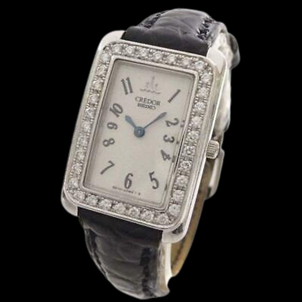 Authentic Seiko Credor Diamond Bezel Ladies Qz White: Brand: name SEIKO Product Name Credor Diamond Bezel Quartz Watch Target ladies Model: 5A70-0AB0 Color silver black Material 18k white gold leather Size Case (excluding crown): Approx. W18mm x H23mm Ar