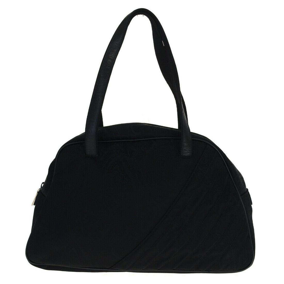 Authentic ETRO Shoulder Bag: Brand: ETRO Model: Shoulder Bag Country of Origin: Italy Material: Canvas Leather Color: Black Size (Inch): W13X H8.7X D5.5"Size (CM): W33X H22X D14Cm All Bidhaus items come with a 100 % money-back au