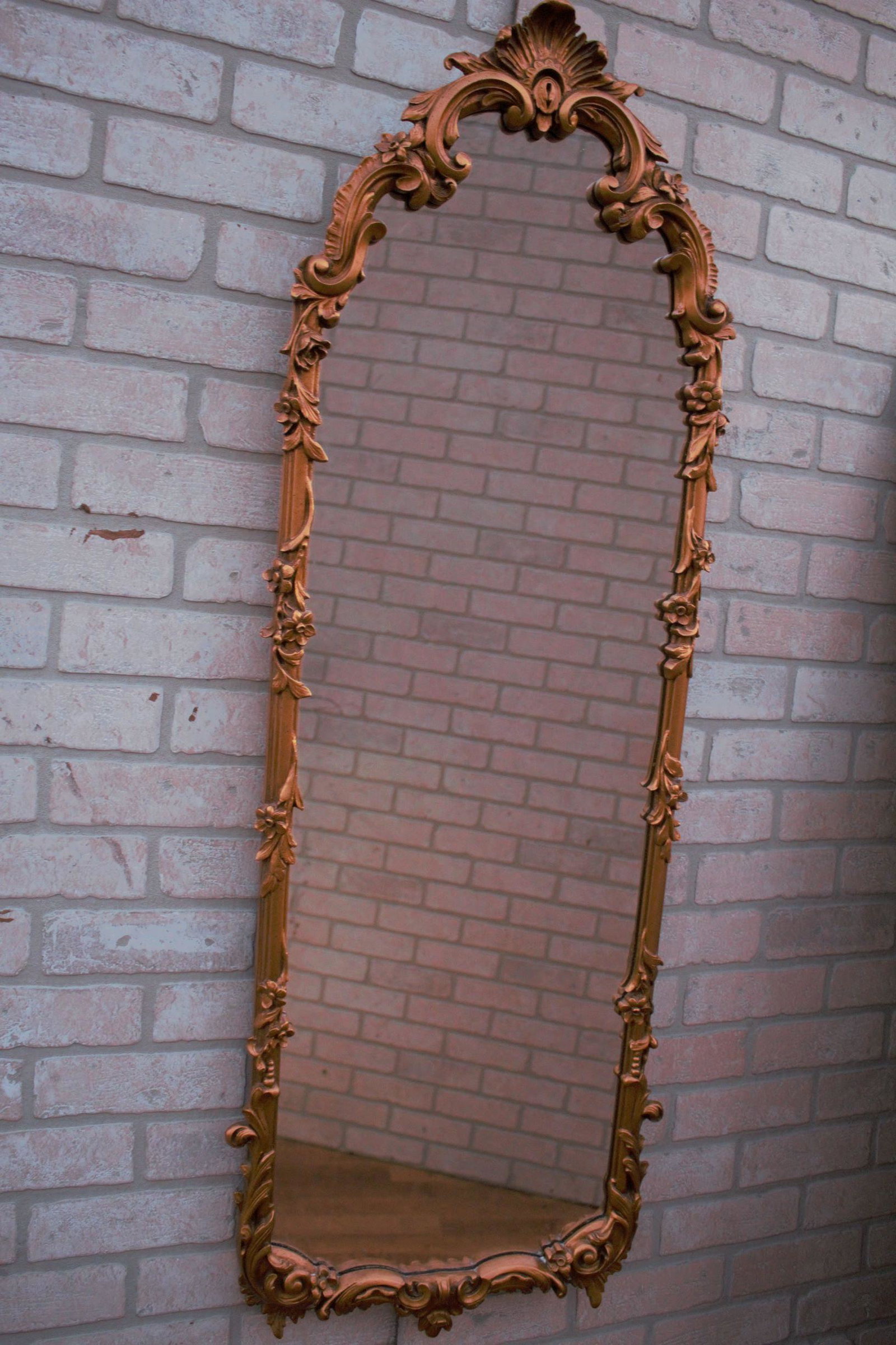 Rococo Ornate Carved Gold Frame Wall Mirror: Rococo Ornate Carved Gold Frame Wall Mirror Circa 1940 H 50 W 17 D 1.5 Good vintage condition All Bidhaus items come with a 100% money-back guarantee that the item is as described. ALL SALES ARE FINAL