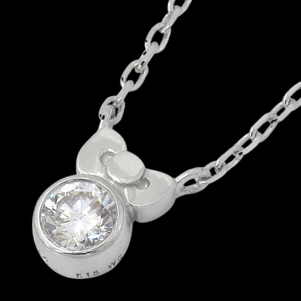 Authentic Sanrio necklace Hello Kitty K18 Gold Ribbon: Condition: New chain length is ~45cm (with adjustable length adjuster) charm size is 0.6cmx 0.4cmx 0.2cm Materials : K18 Diamond 0.07ct What you see in the pictures is all you receive. Pictures have a