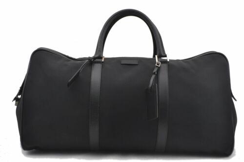 Authentic GUCCI Travel Bag: Brand: GUCCI Model: Travel Bag Country of Origin: Italy Material: Nylon Color: Black Bag Length: 25.2inches (64cm) Bag Height: 12.6inches (32cm) Bag Depth: 10.6inches (27cm) All Bidhaus items come wit