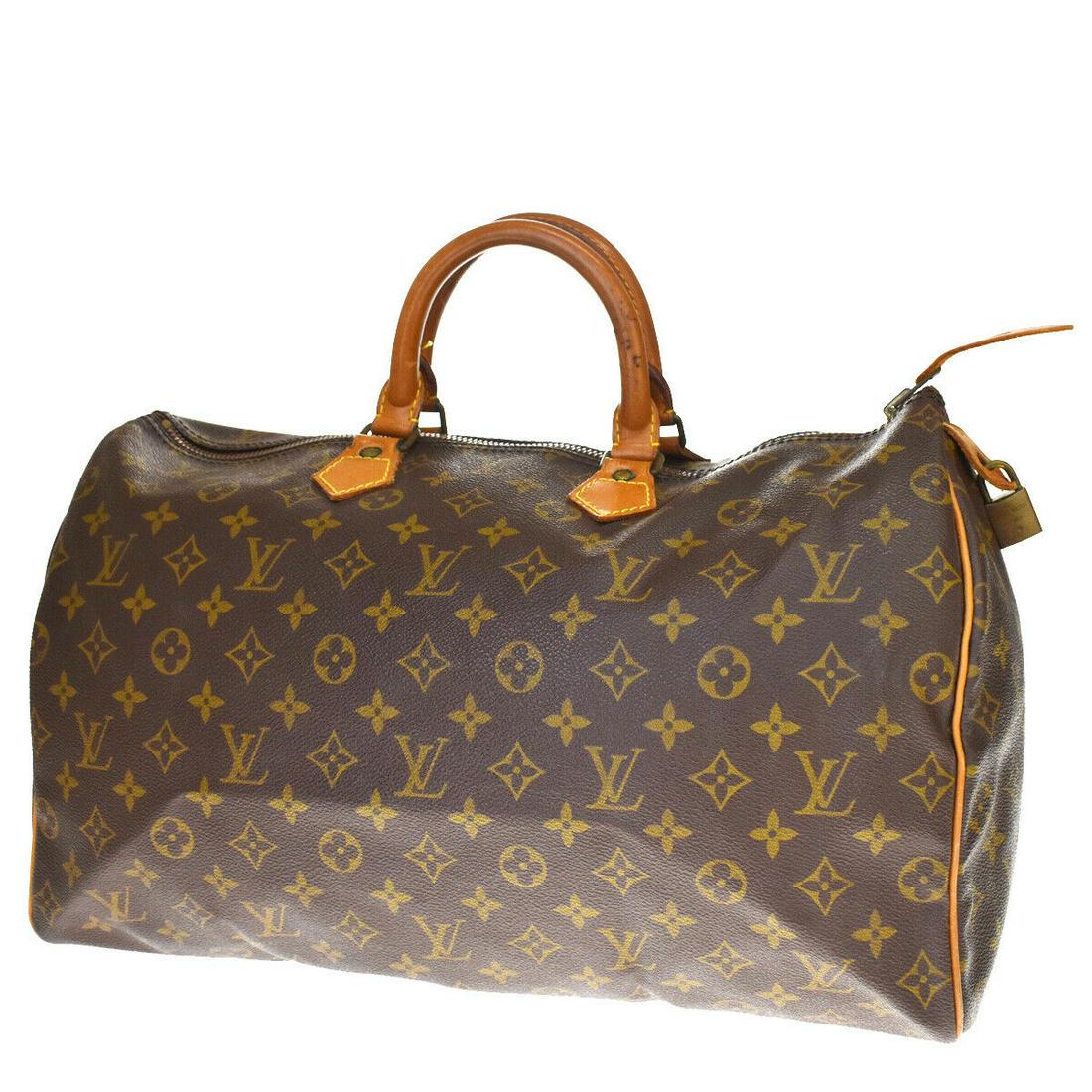 Authentic LOUIS VUITTON Hand Bag: Brand: LOUIS VUITTON Model: Hand Bag Country of Origin: France Material: Monogram Leather Color: Brown Size (Inch): W15.7X H9.1X D7.9"Size (CM): W40X H23X D20Cm All Bidhaus items come with a 100 % mon