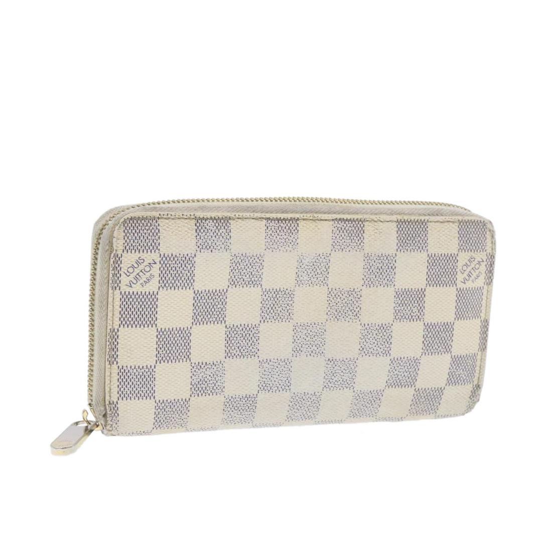 Authentic LOUIS VUITTON Damier Azur Canvas Wallet: Brand: LOUIS VUITTON Material: Damier Azur Canvas Style: Wallet Color: Damier Azur Size(inch): W7.6 x H4.1 x D0.7"(Approx) Country of Origin: Spain Accessory: There is no item box and dust bag. We wil
