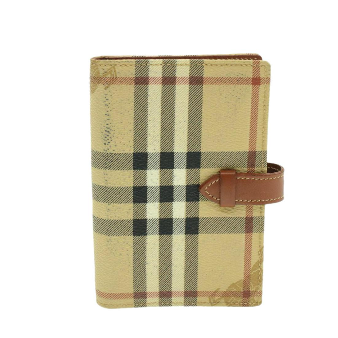 Authentic BURBERRY PVC Leather Day Planner Cover: Brand: BURBERRY Material: PVC Leather Style: Day Planner Cover Color: Beige Size(inch): W3.54 x H5.31 x D0.78inch(Approx) Country of Origin: Italy Accessory: There is no item box and dust bag. We will