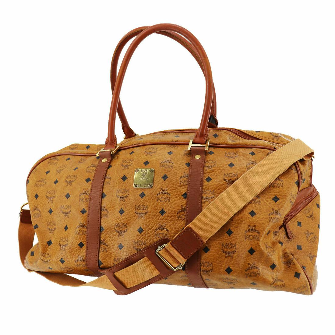 Authentic MCM Shoulder Bag: Brand: MCM Model: Shoulder Bag Country of Origin: Germany Material: Canvas Color: Brown Bag Length: 21.6 Bag Height: 13.3 Bag Depth: 11.8 All Bidhaus items come with a 100 % money-back authenticity gu