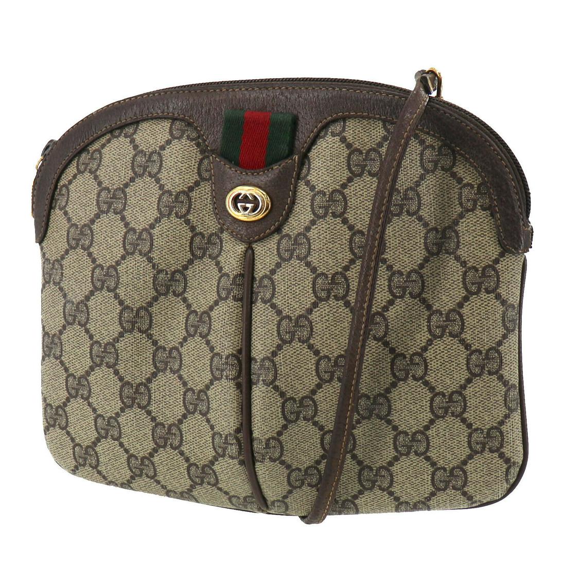 Authentic GUCCI Shoulder Bag: Brand: GUCCI Model: Shoulder Bag Country of Origin: Italy Material: Leather Color: Gold Bag Length: 9.0 Bag Height: 7.8 Bag Depth: 0.7 All Bidhaus items come with a 100 % money-back authenticity guara