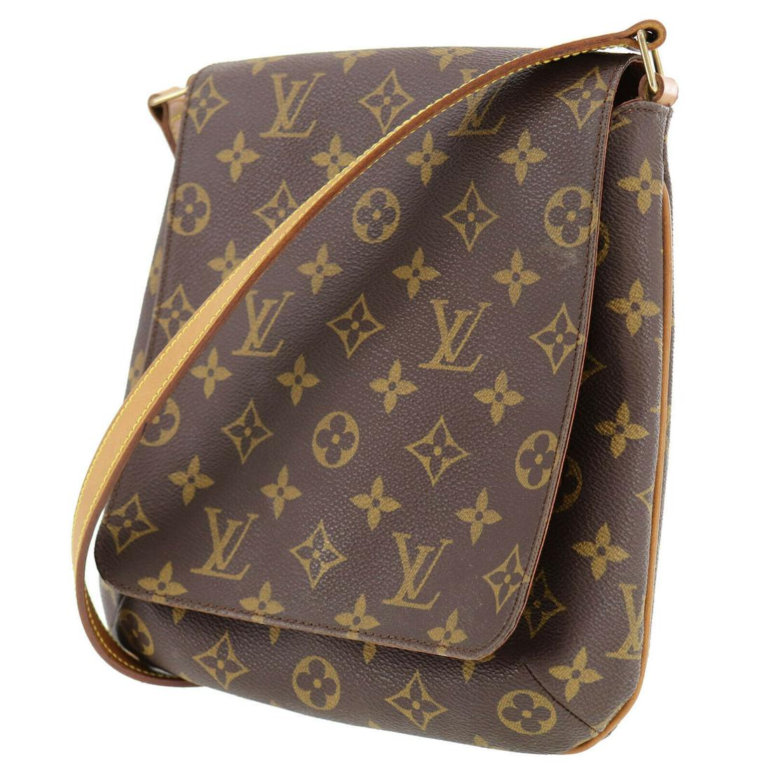 Authentic LOUIS VUITTON Hand Bag: Brand: LOUIS VUITTON Model: Hand Bag Country of Origin: France Material: Suede Color: Gold Bag Length: 9.2 Bag Height: 9.0 Bag Depth: 1.9 All Bidhaus items come with a 100 % money-back authenticity gu