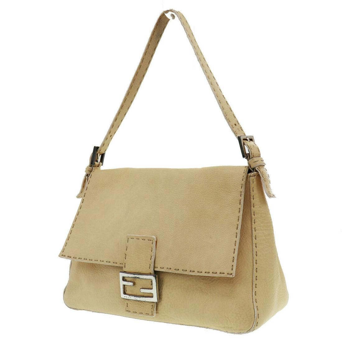 Authentic FENDI Hand Bag: Brand: FENDI Model: Hand Bag Country of Origin: Italy Material: Suede Color: Cream Bag Length: 11.4 Bag Height: 8.6 Bag Depth: 4.7 All Bidhaus items come with a 100 % money-back authenticity guarantee