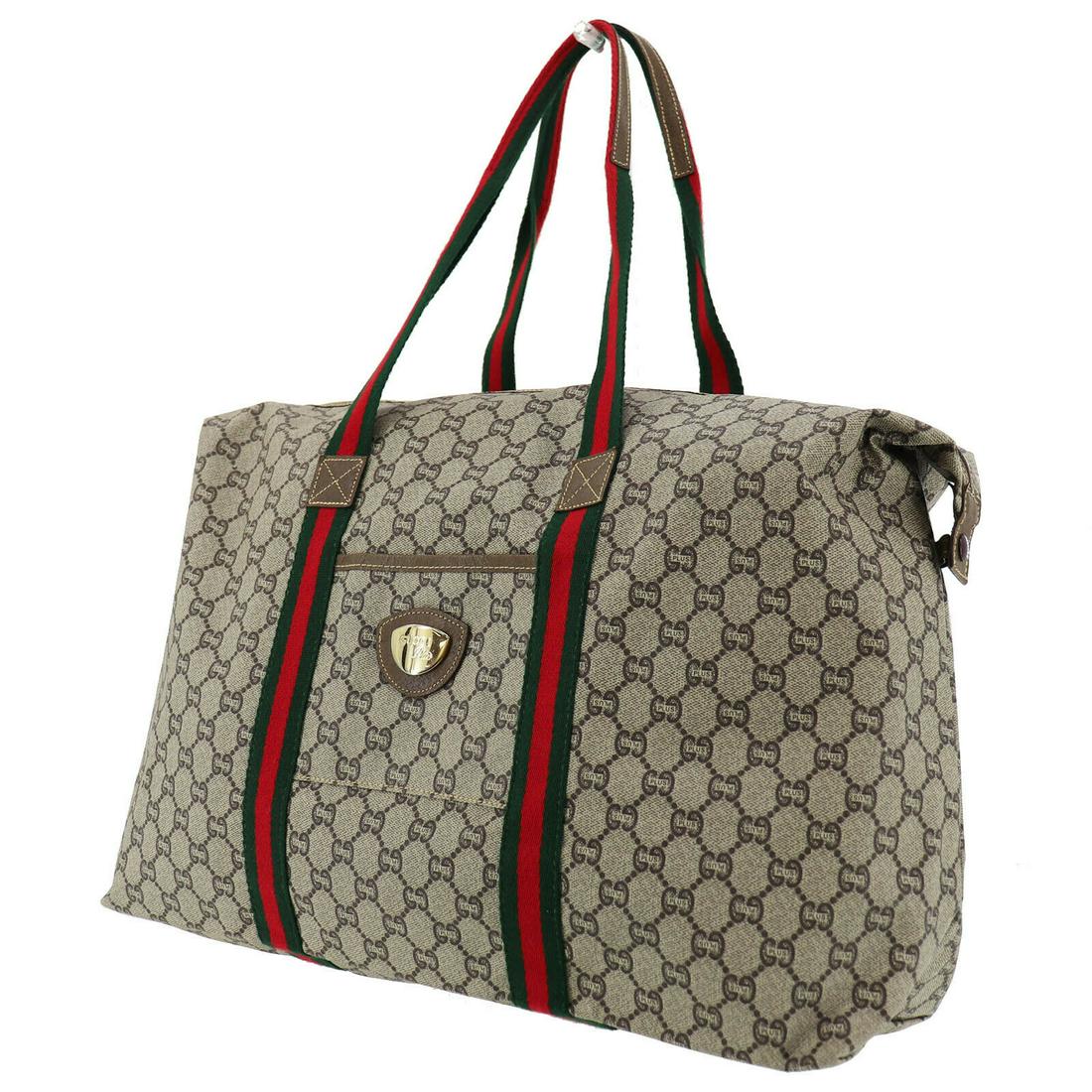 Authentic GUCCI Tote: Brand: GUCCI Model: Tote Country of Origin: Italy Material: Canvas Color: Gold Bag Length: 17.3 Bag Height: 13.7 Bag Depth: 6.1 All Bidhaus items come with a 100 % money-back authenticity guarantee. A