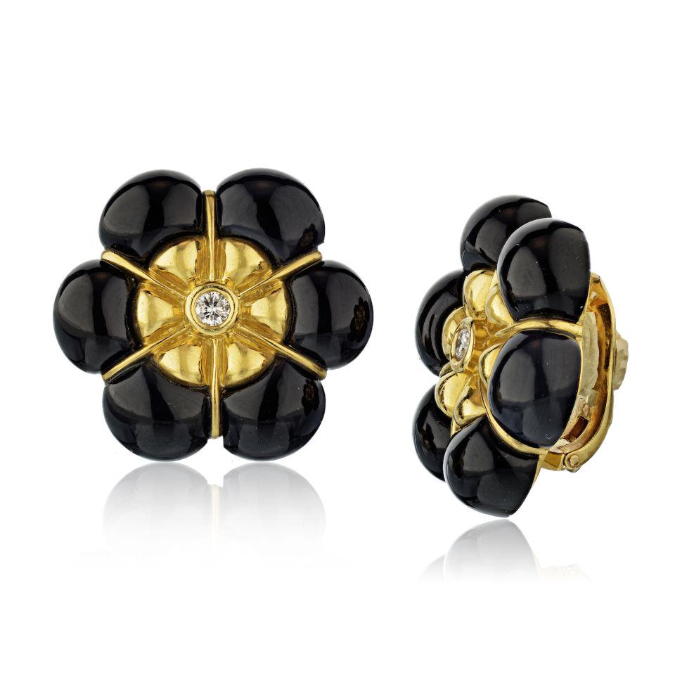 Authentic Van Cleef & Arpels Van Cleef & Arpels: Type: Vintage Earrings Brand: Van Cleef & Arpels Metal: 18K Yellow Gold Grams: 34 Other Details: The earclips of floral design centering round diamonds weighing approximately .24 carats signed Van Cle