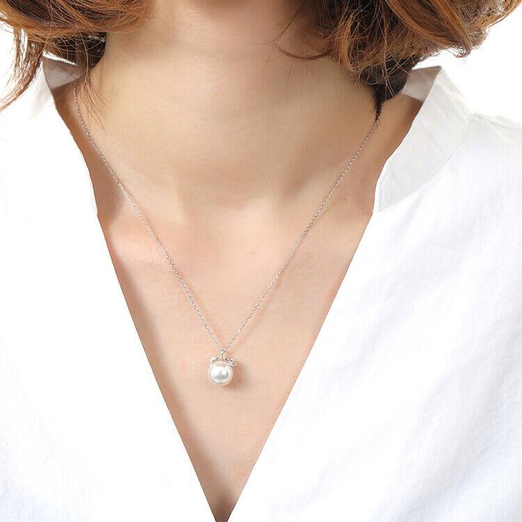 Authentic Sanrio necklace Hello Kitty Cat ears Ladies: Condition: New chain length is 45cm ( Free adjuster type with adjustable length) charm size is 12mm 10mm Materials : 925 silver (top chain common) Synthetic Pearl Pink gold color (pink gold plated) Si