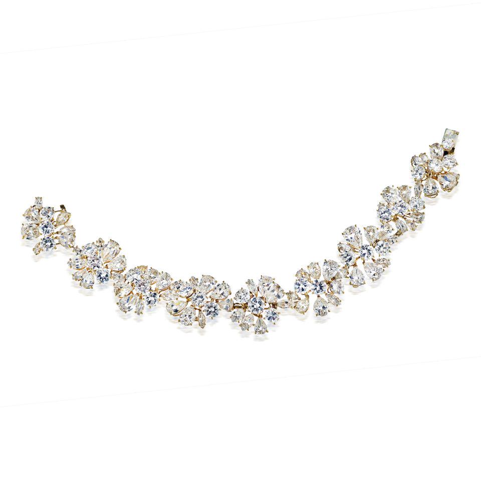 Authentic Van Cleef & Arpels Van Cleef & Arpels: Type: Vintage Bracelets Brand: Van Cleef & Arpels Metal: Platinum & 18K Yellow Gold Grams: 50 Exact Diamond Weight: 47.5 Cts Other Details: Crafted in 1970 s by Van Cleef & Arpels diamond bracelet is