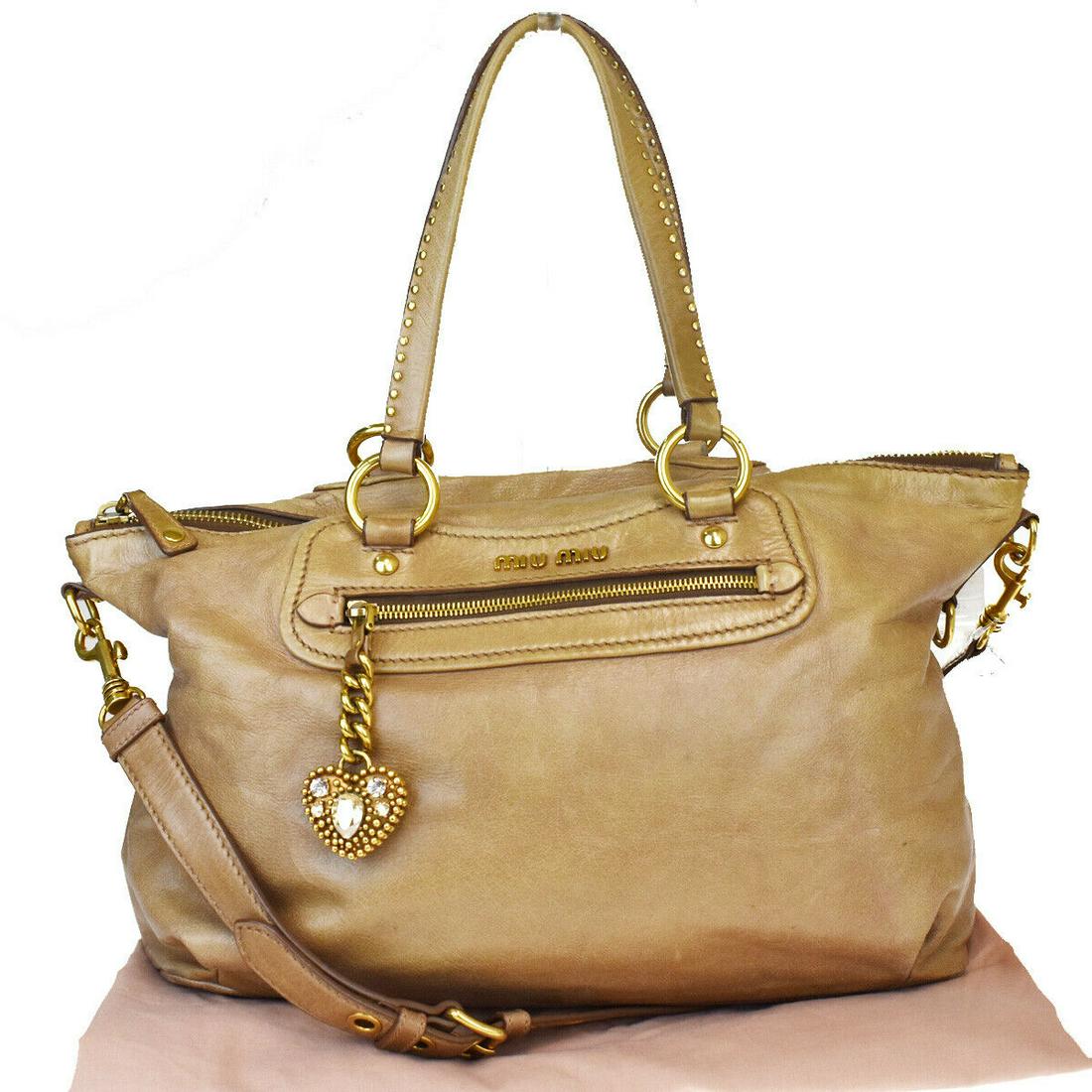 Authentic MIU Shoulder Bag: Brand: MIU Model: Shoulder Bag Country of Origin: Material: Leather Color: Brown Size (Inch): W16.9X H9.1X D4.7"Size (CM): W43X H23X D12Cm All Bidhaus items come with a 100 % money-back authenticity g