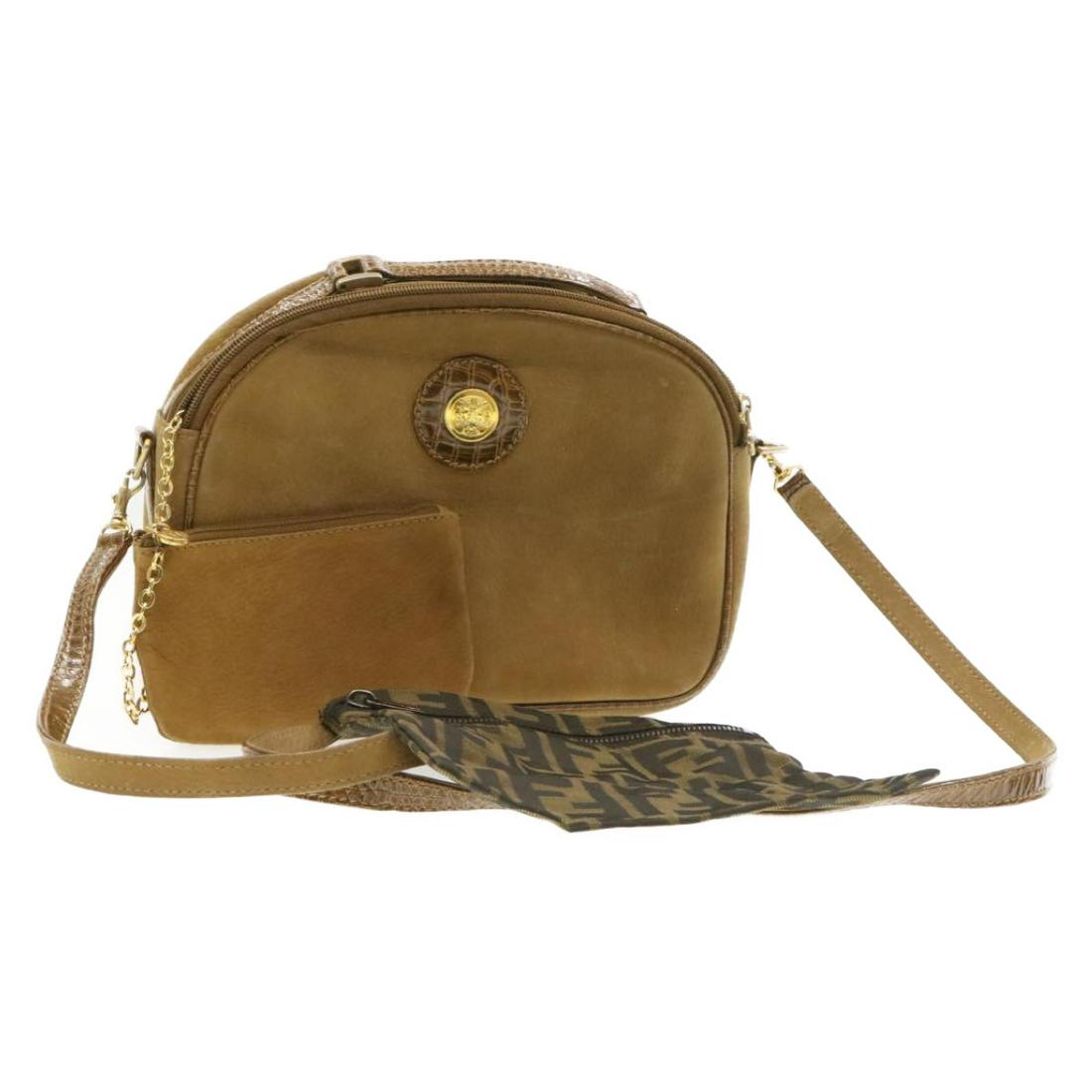 Authentic FENDI Leather / Canvas Shoulder Bag: Brand: FENDI Material: Leather / Canvas Style: Shoulder Bag Color: Brown Size(inch): W9.84 x H7.08 x D2.55inch / Shoulder Drop 20.47inch(Approx)W7.87 x H7.08inch(Approx) Country of Origin: - Accessory