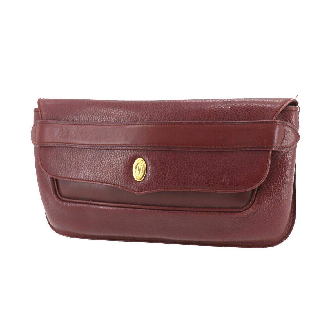 Authentic CARTIER Clutch: Brand: CARTIER Model: Clutch Country of Origin: Spain Material: Nylon Color: Red Size (inch): me All Bidhaus items come with a 100 % money-back authenticity guarantee. ALL SALES ARE FINAL. Please refe