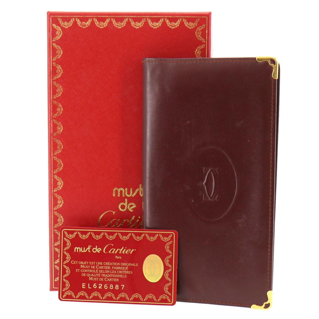 Authentic CARTIER Wallet: Brand: CARTIER Model: Wallet Country of Origin: Material: Leather Color: Bordeaux All Bidhaus items come with a 100 % money-back authenticity guarantee. ALL SALES ARE FINAL. Please refer to images car