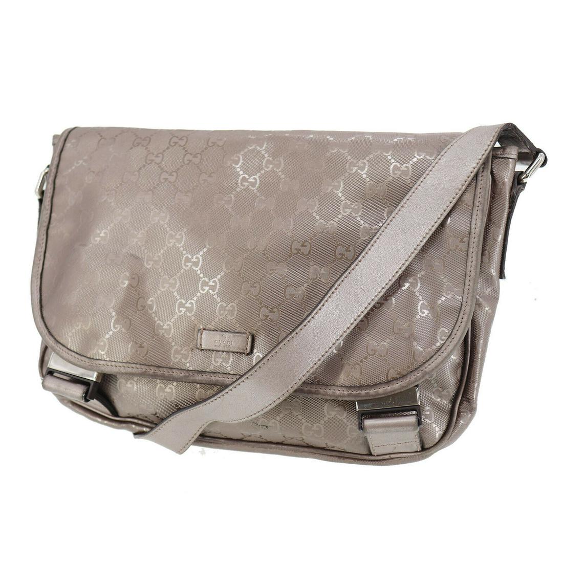 Authentic GUCCI Shoulder Bag: Brand: GUCCI Model: Shoulder Bag Country of Origin: Italy Material: Canvas Color: Brown Bag Length: 12.5 Bag Height: 9.8 Bag Depth: 4.3 All Bidhaus items come with a 100 % money-back authenticity guar