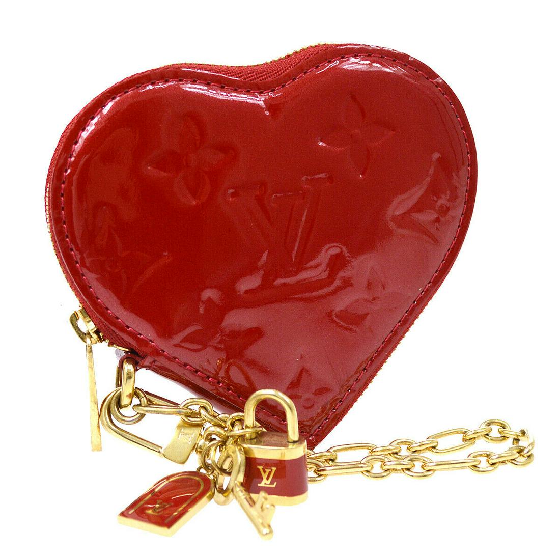 Authentic LOUIS VUITTON Wallet: Brand: LOUIS VUITTON Model: Wallet Country of Origin: France Material: Patent Leather Color: Red Size (Inch): W 4.1 x H 3.7 " Size (CM): W 10.5 x H 9.5 cm All Bidhaus items come with a 100 % money-bac