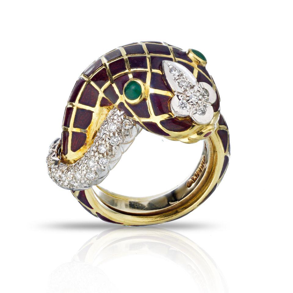 Authentic David Webb David Webb Platinum & 18K Yellow: Type: Estate Rings Brand: David Webb Metal: Platinum & 18K Yellow Gold Grams: 19.7 Approximate Diamond Weight: 0.35 Cts Other Details: David Webb serpents of a cross over designs are his well known si