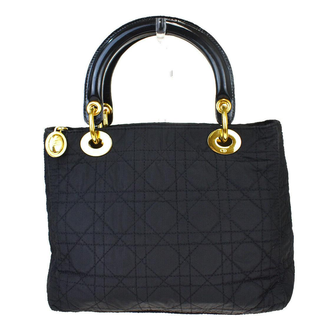 Authentic CHRISTIAN DIOR Hand Bag: Brand: CHRISTIAN DIOR Model: Hand Bag Country of Origin: Italy Material: Denim Color: Gray Size (Inch): W9.4X H7.9X D3.9"Size (CM): W24X H20X D10Cm All Bidhaus items come with a 100 % money-back authe