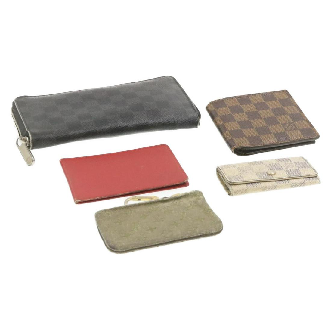 Authentic LOUIS VUITTON PVC Leather / Canvas Wallet: Brand: LOUIS VUITTON Material: PVC Leather / Canvas Style: Wallet Color: Black / Brown / Red / Khaki / White Size(inch): - Country of Origin: - Accessory: There is no item box and dust bag. We will se