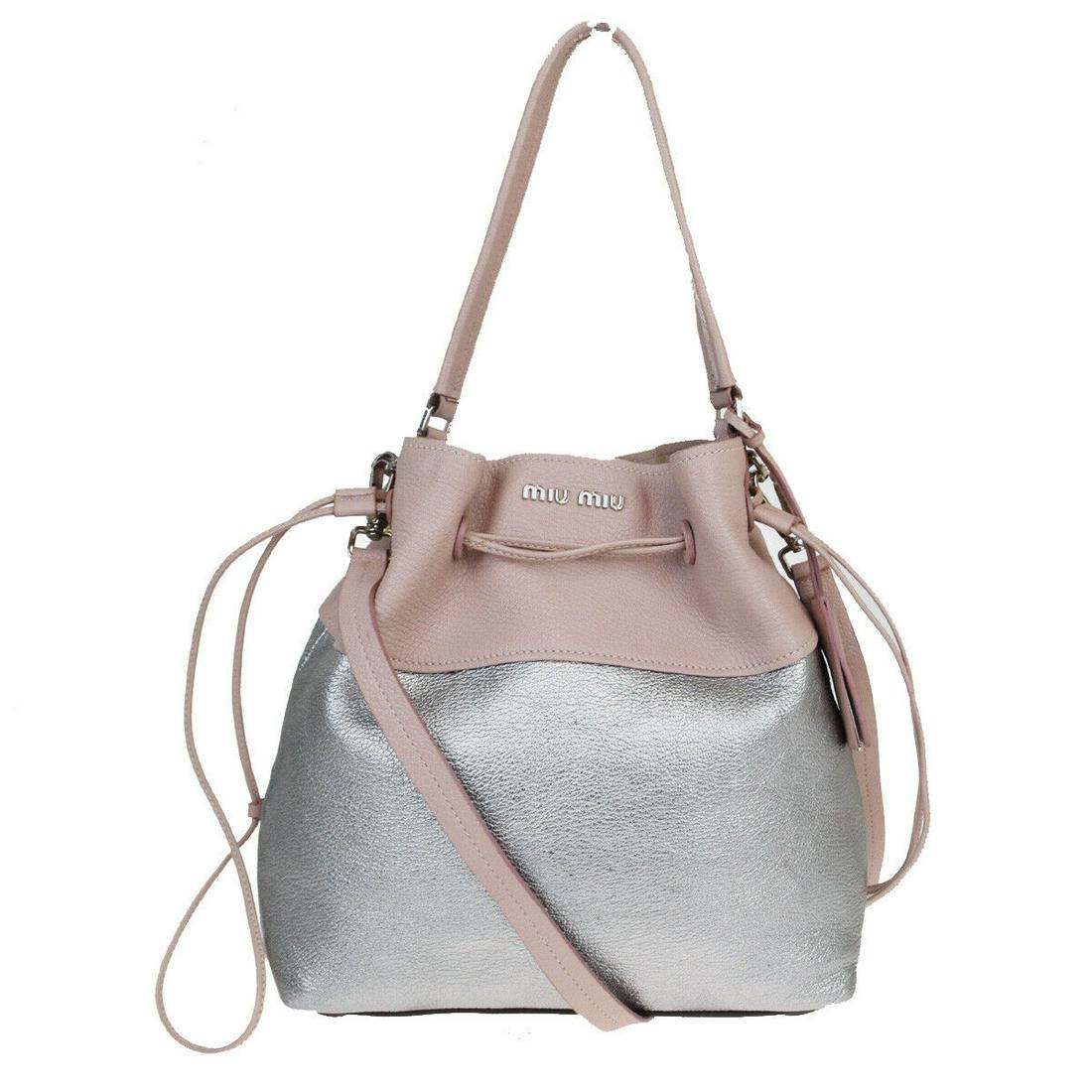 Authentic MIU Shoulder Bag: Brand: MIU Model: Shoulder Bag Country of Origin: Material: Leather Color: Pink Silver Size (Inch): W10.6X H11.4X D5.1"Size (CM): W27X H29X D13Cm All Bidhaus items come with a 100 % money-back authent