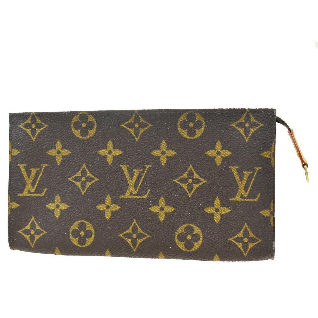 Authentic LOUIS VUITTON Pouch: Brand: LOUIS VUITTON Model: Pouch Country of Origin: France Material: Monogram Leather Color: Brown Size (Inch): W7.7X H4.3X D0.6"Size (CM): W19.5X H11X D1.5Cm All Bidhaus items come with a 100 % mone